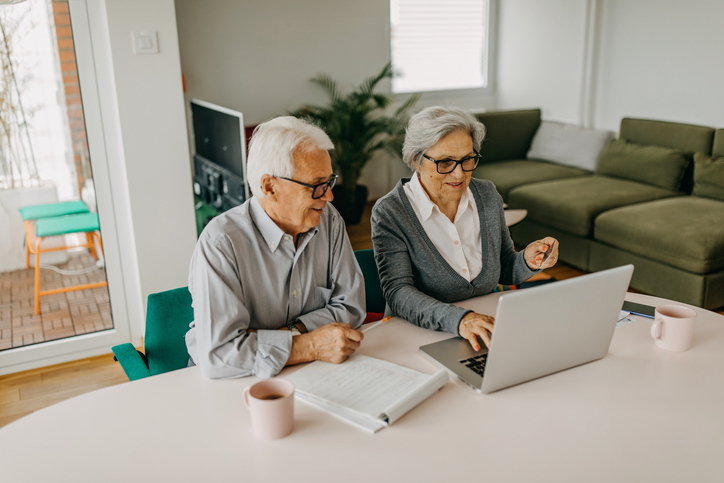 A senior couple reviewing their estate plan in Illinois.