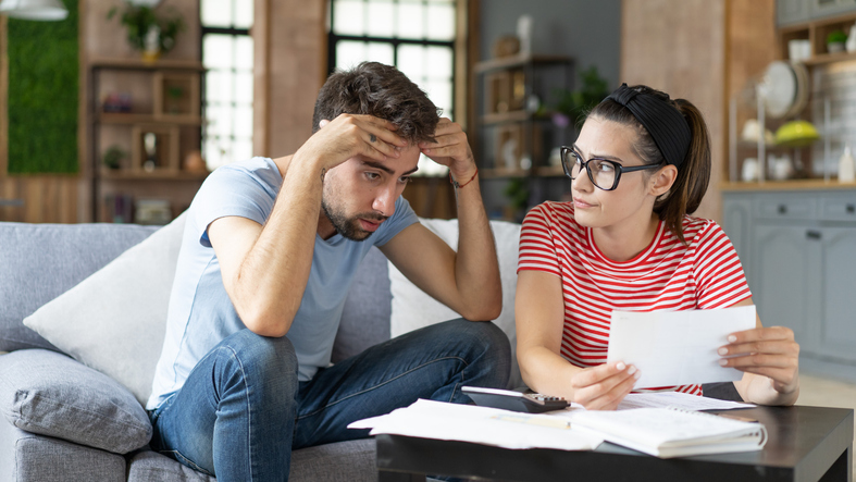 Parents calculating child support for their children in Kansas.