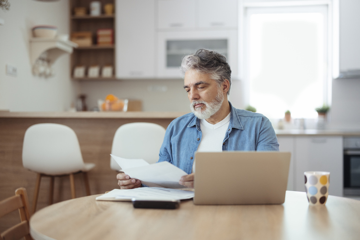 A man reviewing his estate plan in Oregon.