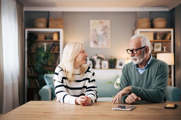 A senior couple discussing different types of powers of attorney in Kentucky.