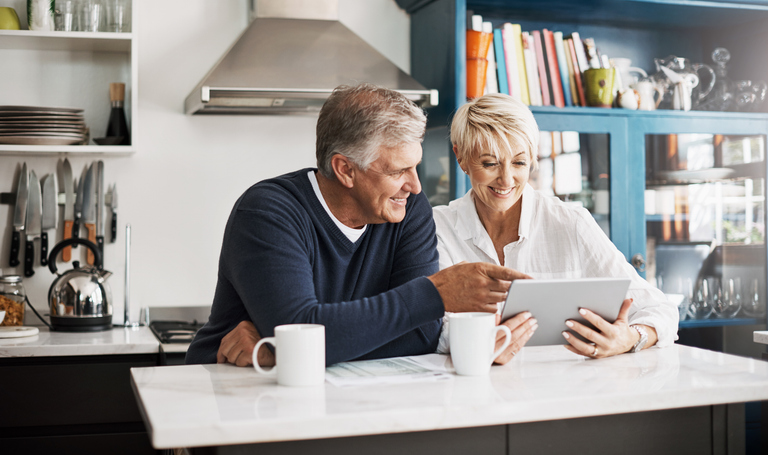 A couple comparing different annuities.