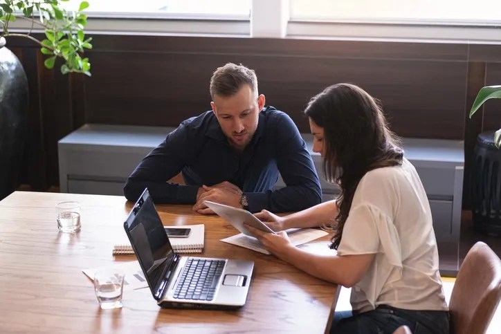 A couple researching powers of attorney available in Maine.