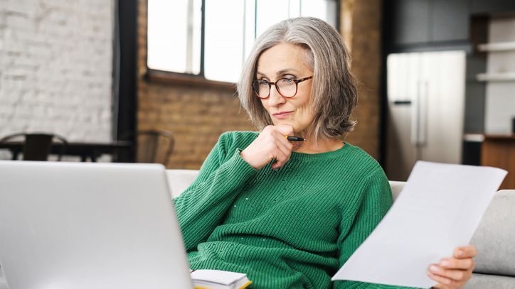 A woman looks over the rules for dealing with excess accumulation in her qualified retirement plan.