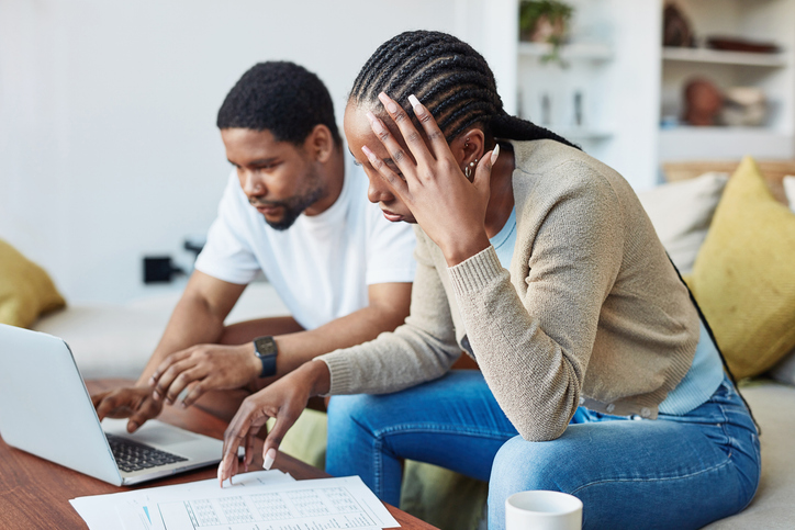 Parents calculating how much health coverage will cost for their child.