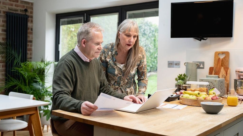 An American couple living and working in London look over their self-invested personal pensions (SIPPs).