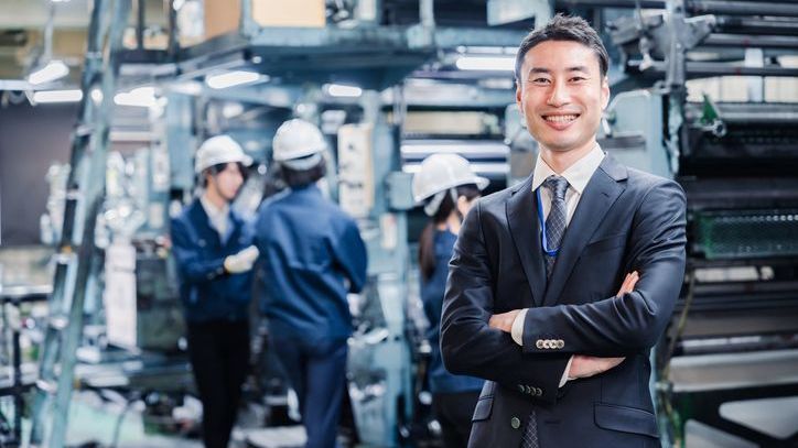 General partners of a manufacturing business tour the company's factory.