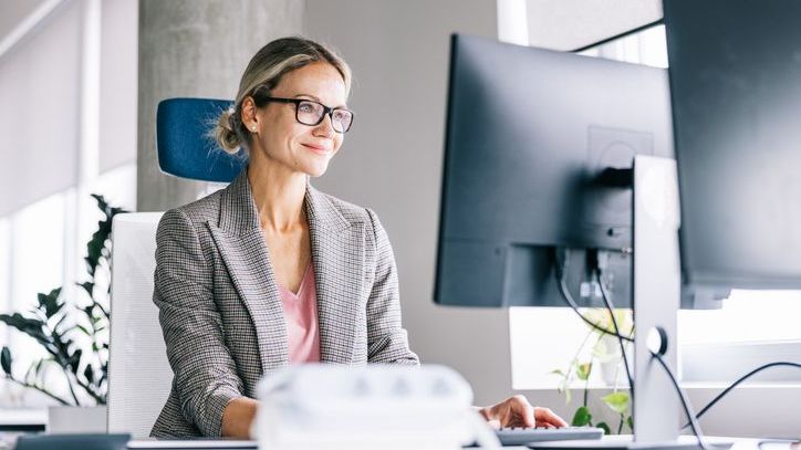 A financial advisor works on her marketing plan.