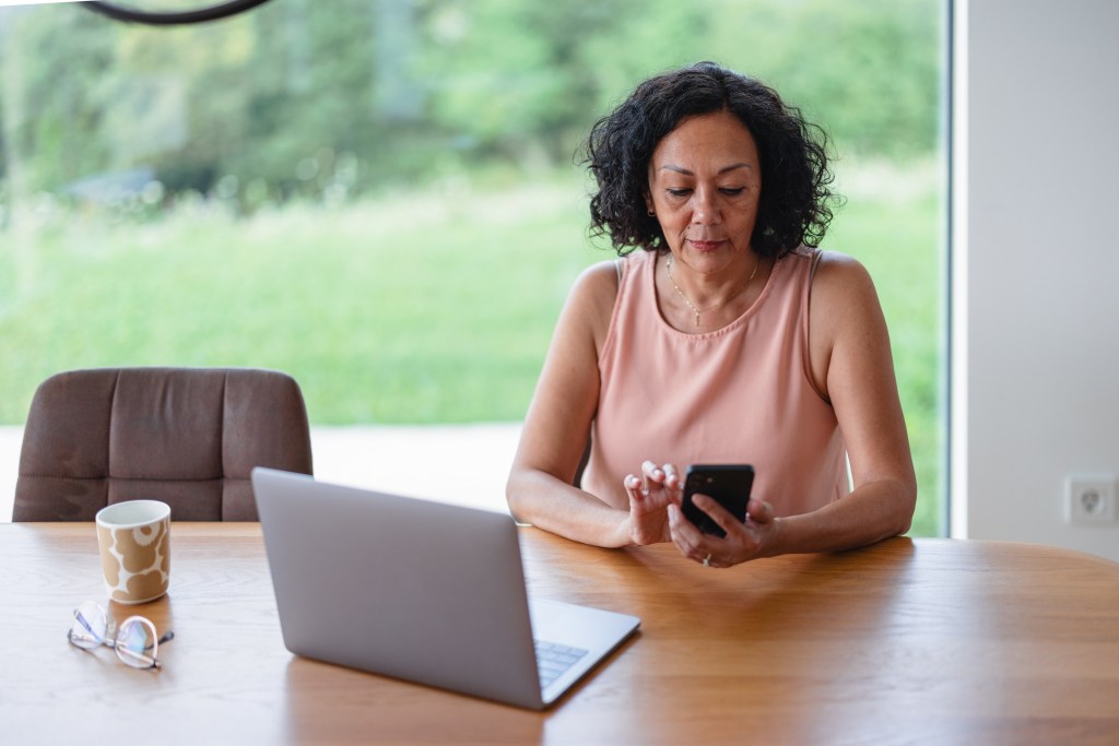 A woman looking up her Social Security benefits.