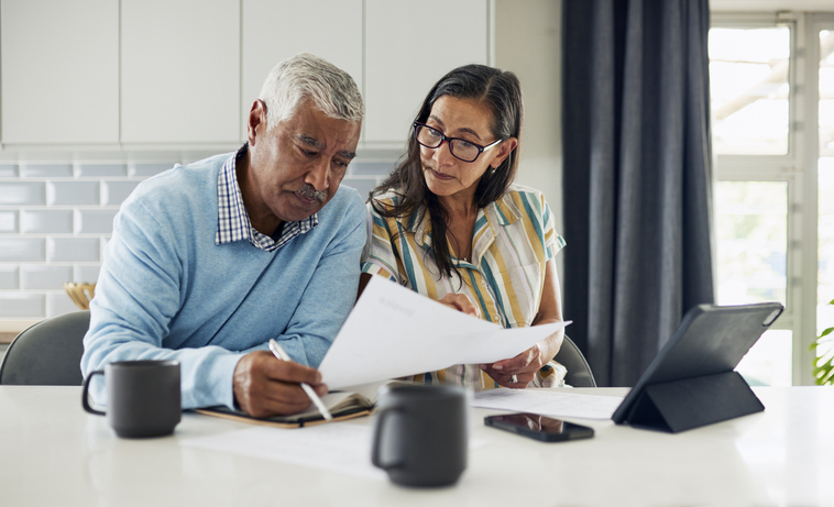 A senior couple reviewing their estate plan in Iowa.