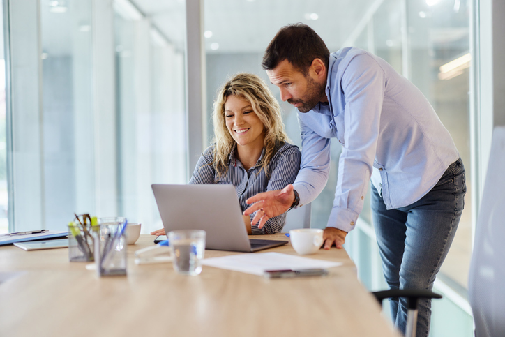 A client working with a financial advisor to manage their investments.