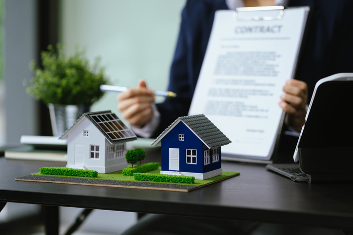 An investor buying a tax lien from a county office.