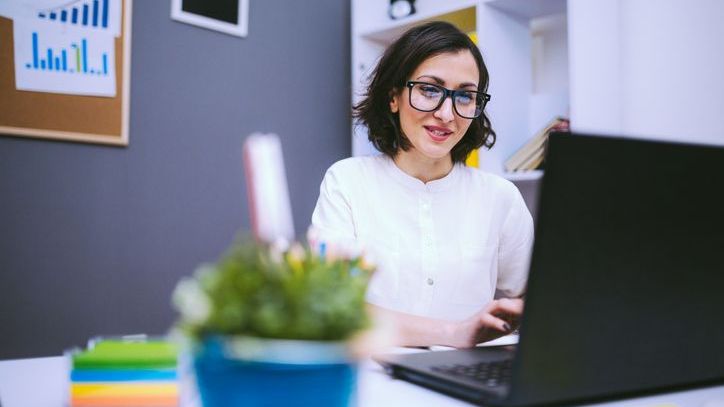 An employee of a nonprofit organization reviews her retirement plan.