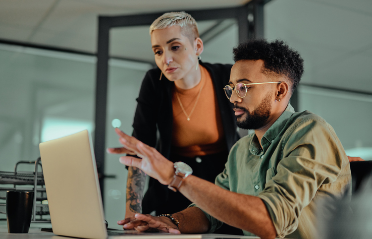 A financial advisor working with an investor to add savings bonds to his portfolio.