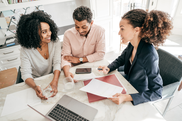 A financial advisor following a business plan to meet with new clients.