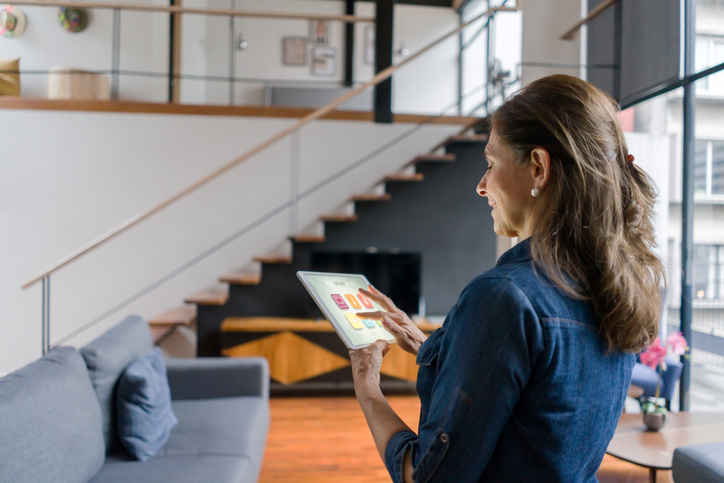 An investor researching how to improve her real estate investments with AI.