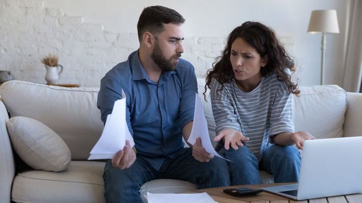 A woman confronts her husband about his financial infidelity.