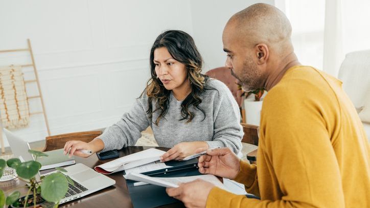 A man and woman who were both previously married work on their estate plan together.