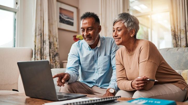 A couple looks over the asset allocation of their retirement portfolio.