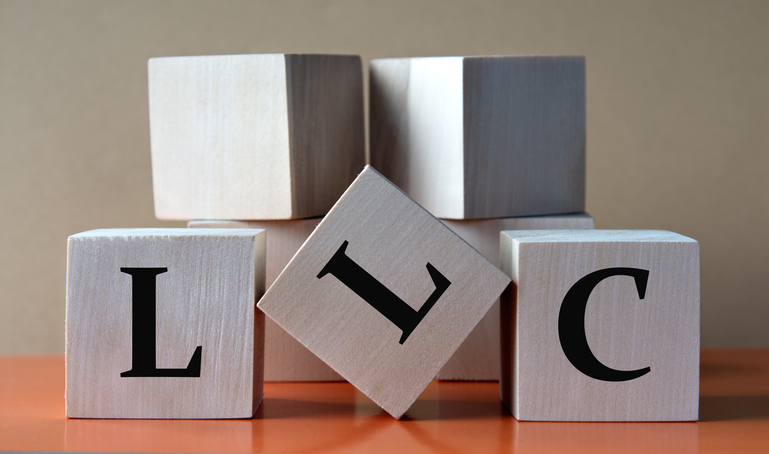 A limited liability company is a business structure that some real estate investors use.