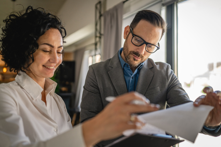 A couple reviewing their investment portfolio.
