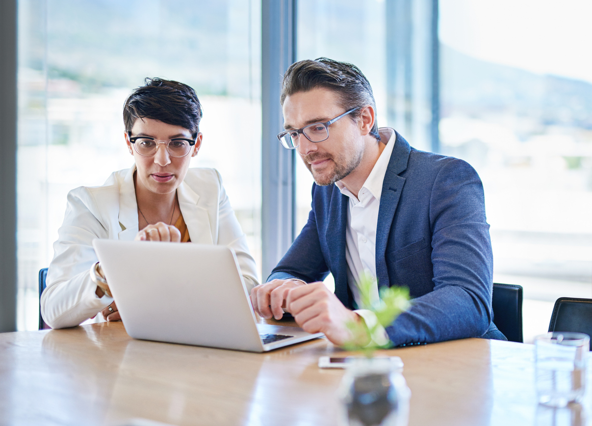 A financial advisor discussing with a client the consequences of taking a TSP hardship withdrawal.