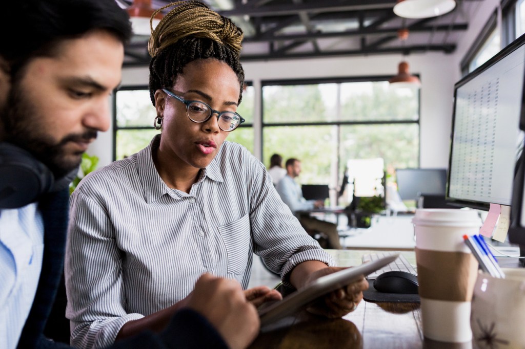 Investors reviewing their portfolio.