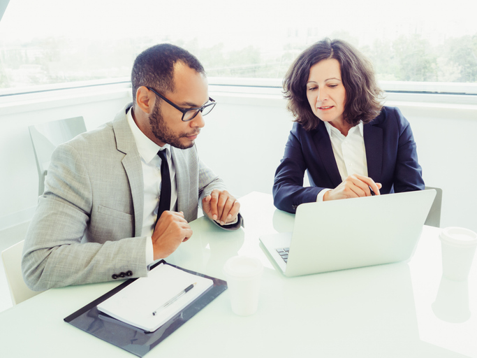 Financial advisors creating a plan to grow their advisory business.