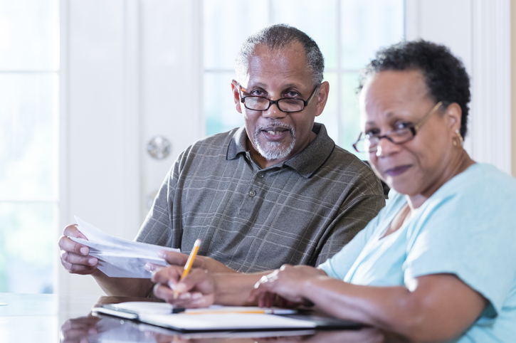 A couple reviewing an estate plan.