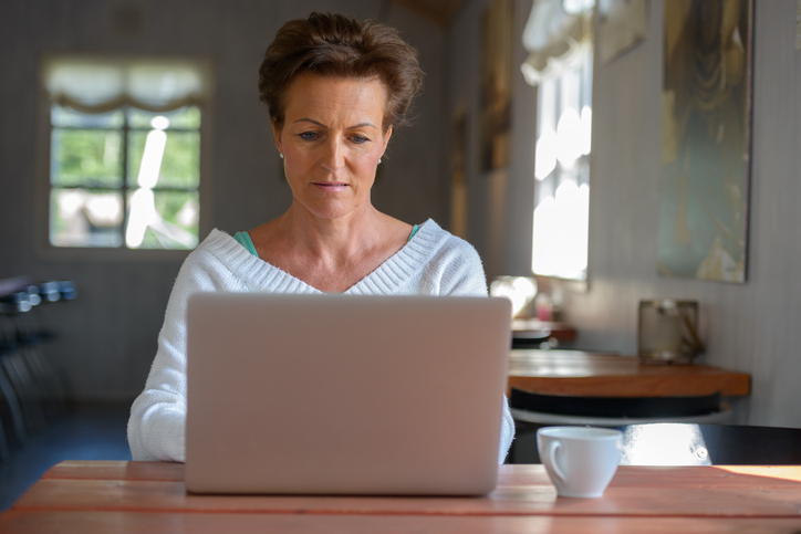 A woman looking up the downsides of using life insurance for retirement.