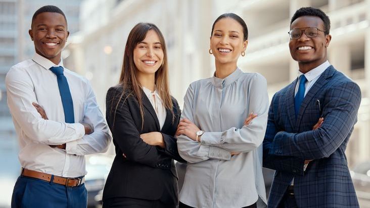 Four young professionals in their 20s work at a law firm.