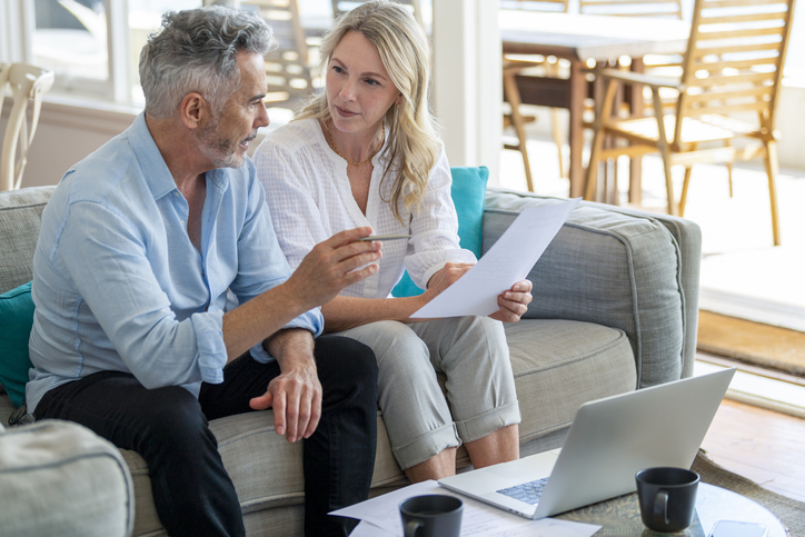 Investors discussing their income investments.