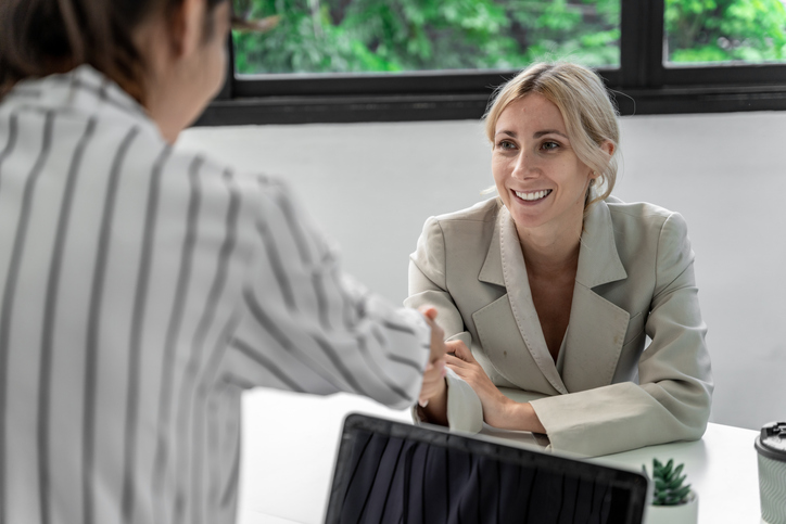 An investor meeting with a financial advisor to review their portfolio.