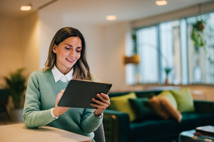 A woman automating her savings contributions.