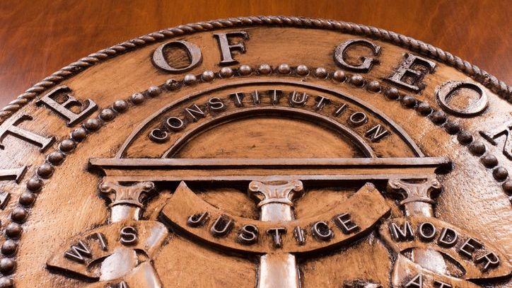 A close-up of Georgia judiciary seal.