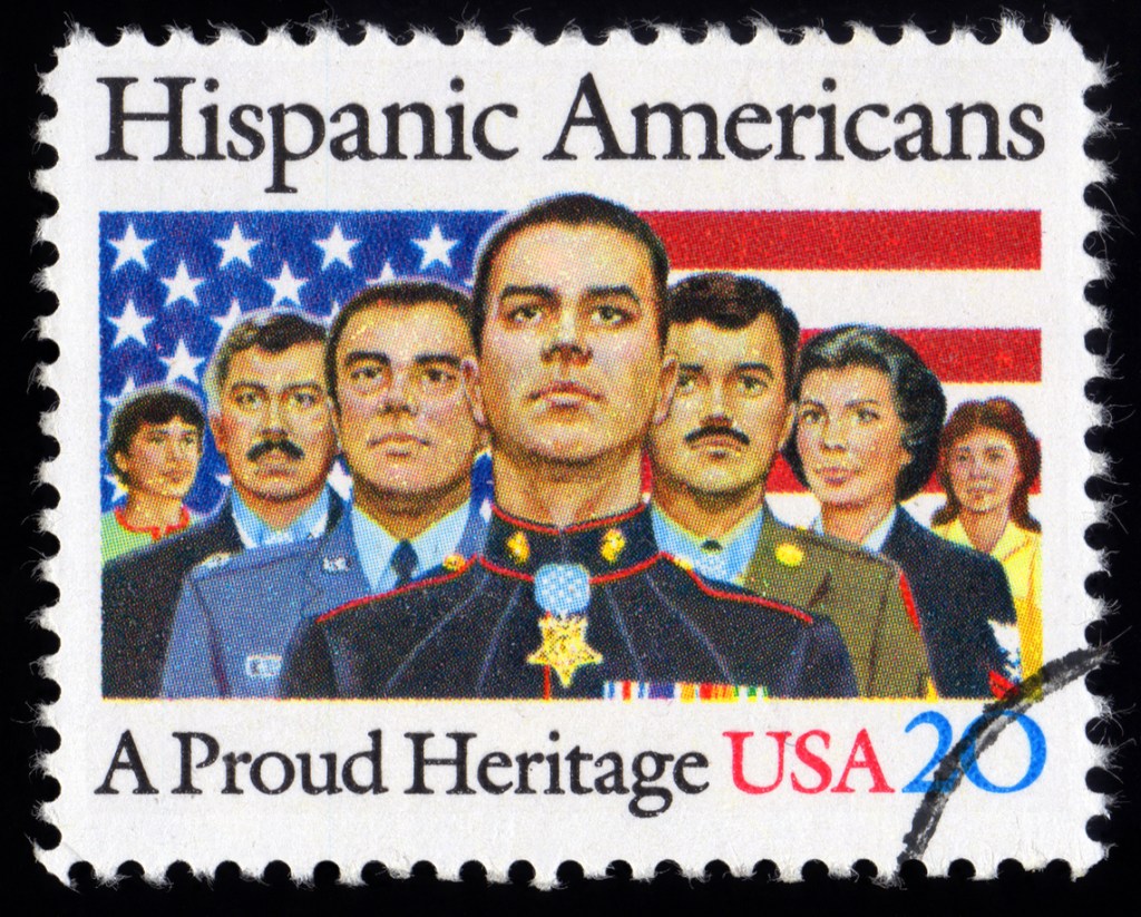 USA postage stamp showing proud Hispanic American men and women marines, soldiers and veterans.