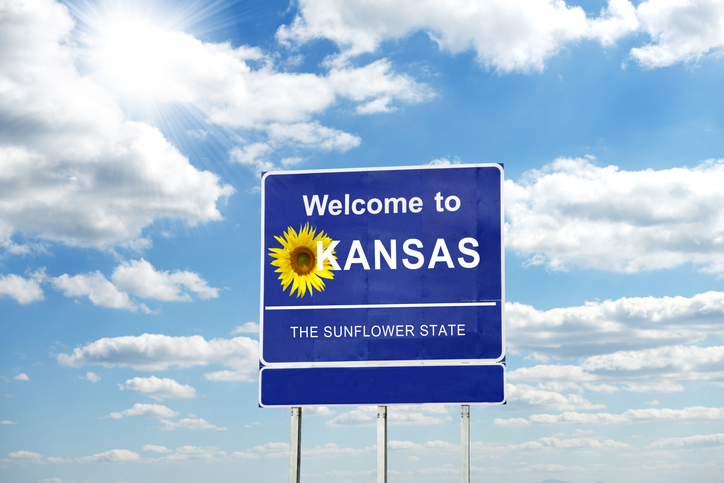 A Kansas welcome road sign.