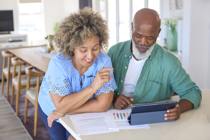 A couple reviewing their fixed income investments.