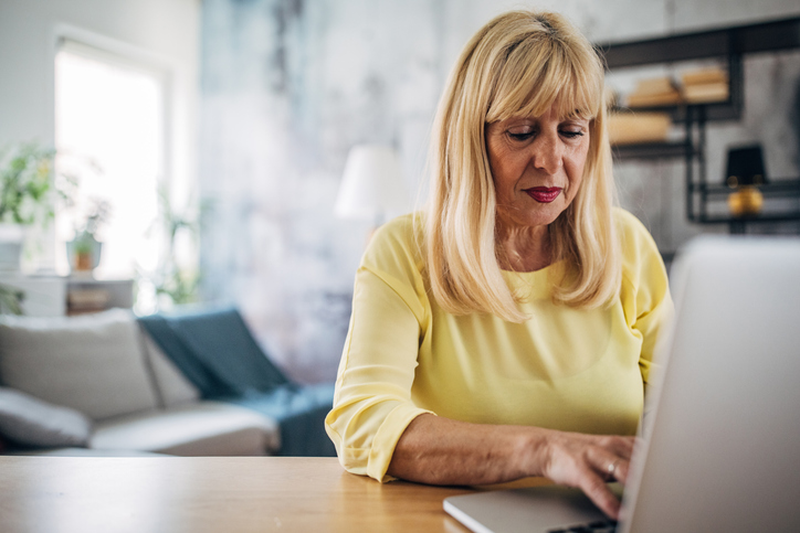 A woman rebalancing he retirement plan.