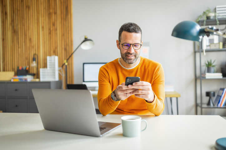 A man creating a financial plan to cover both personal and family needs.