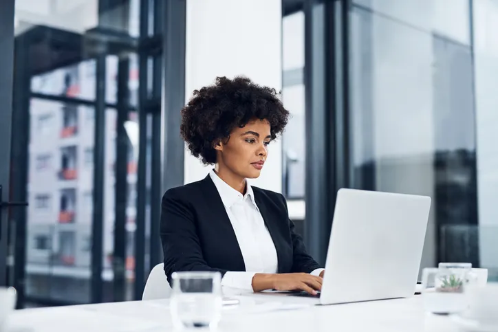 An investor looking up the pros and cons of investing in liquid CDs.