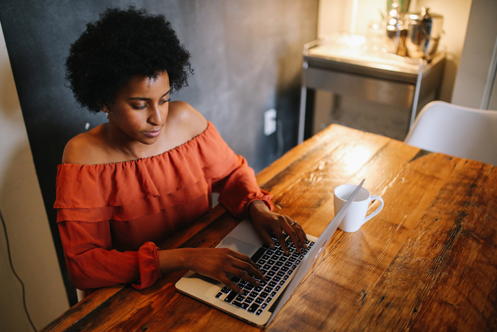 A woman researching whether vitamins are covered by her HSA.