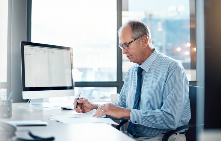 A man reviewing his retirement plan.