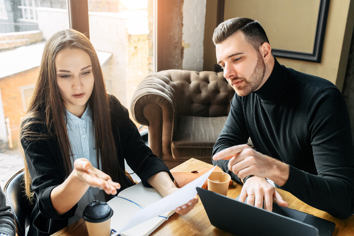 Investors reviewing a real estate portfolio.
