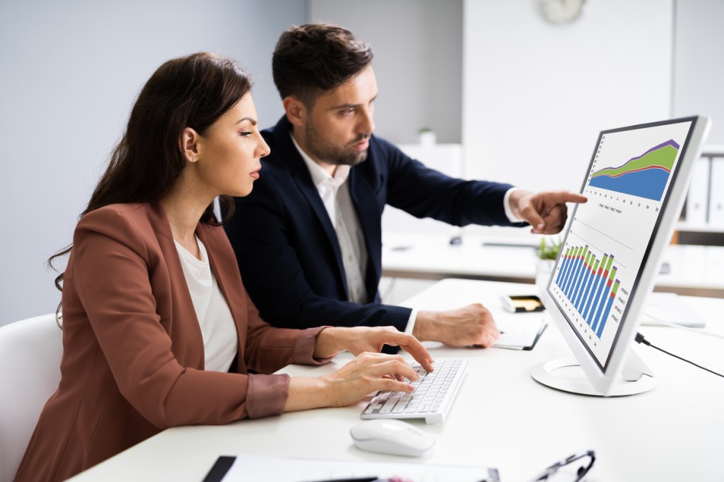 Investors reviewing the performance of a portfolio.