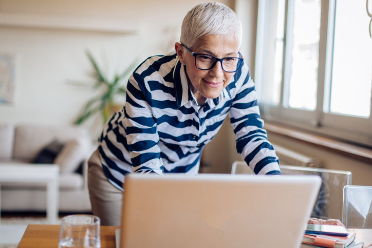 A woman reviewing her finances.