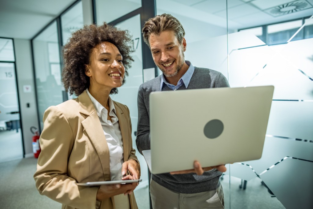 A financial advisor reviewing a dividend portfolio with a client.