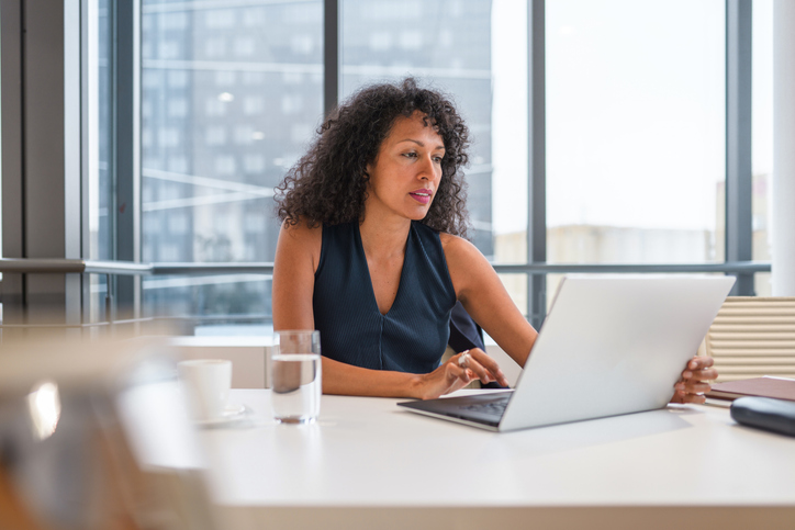 An investor reviews her portfolio, which contains micro-cap stocks.