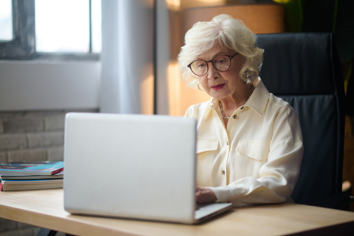 A senior reviewing her tax bill.