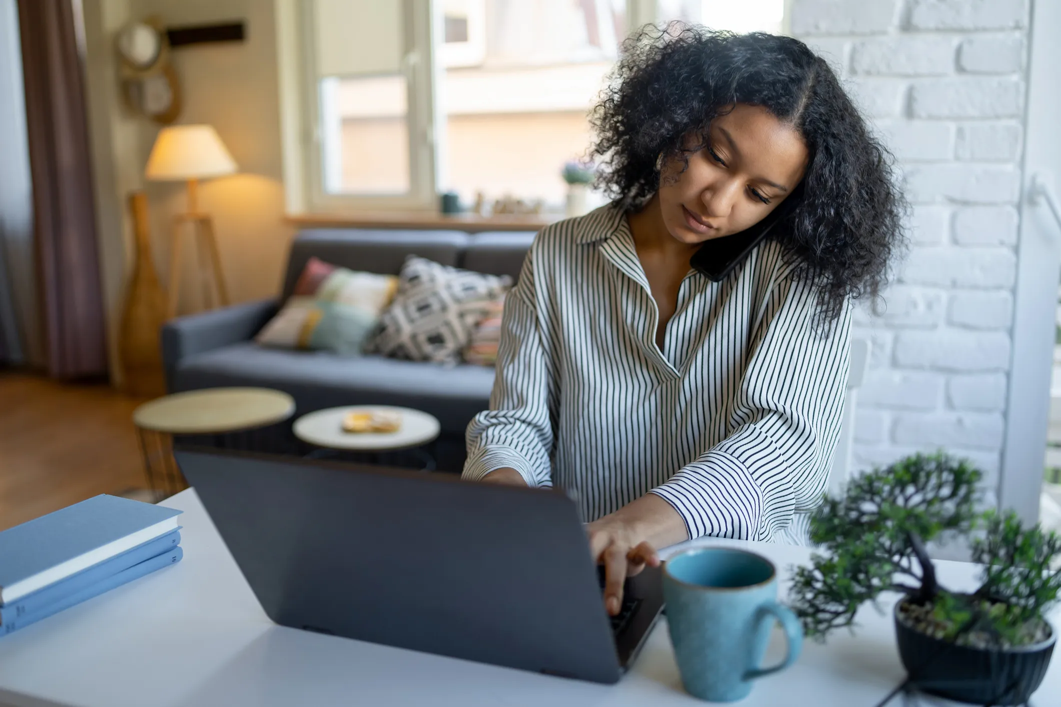 A woman researching HSA rules and requirements.