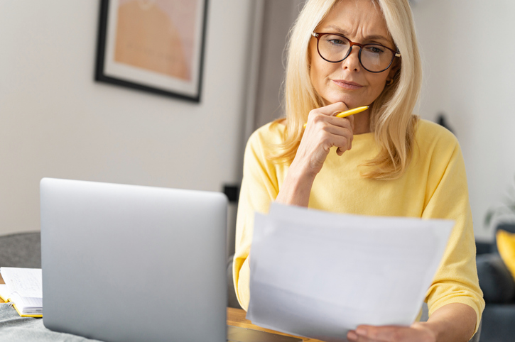 A woman reviewing her estate plan.